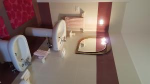 Ванная комната в Appartamento Etna