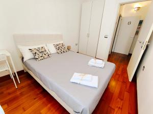 Postel nebo postele na pokoji v ubytování le dimore di Magda suite & rooms