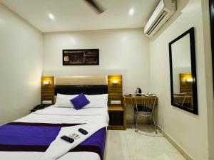Postel nebo postele na pokoji v ubytování Hotel Liwa Inn - By AVK Near NESCO