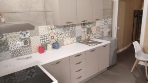 Kuchyň nebo kuchyňský kout v ubytování Casa Mattia - City