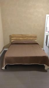 Postel nebo postele na pokoji v ubytování Casa Mattia - City