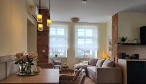 Χώρος καθιστικού στο Apartament w sercu miasta