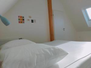 Postel nebo postele na pokoji v ubytování Gite des 3 cigognes