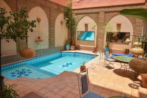 Bazén v ubytování Amani Hotel Suites & Spa nebo v jeho okolí