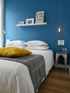 Katil atau katil-katil dalam bilik di Aveiro Rossio Bed & Breakfast