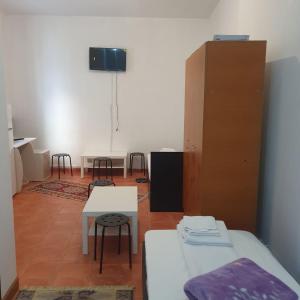 TV a/nebo společenská místnost v ubytování Cazare - Accommodation