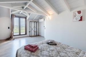 Katil atau katil-katil dalam bilik di Notes View Apartments