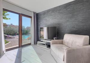 Χώρος καθιστικού στο Villa Chiara 2 Bedroom, Private Pool, BBQ & Child-Friendly