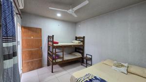 Postel nebo postele na pokoji v ubytování Hostal Fontana Di Luque
