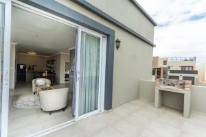 Balkón nebo terasa v ubytování Long Beach Selfcatering Namibia