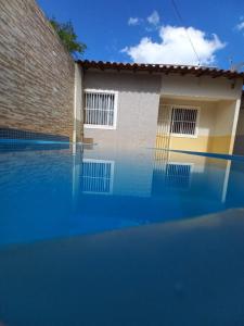 Πισίνα στο ή κοντά στο Casa com lazer até 12 pessoas