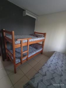 Ένα ή περισσότερα κρεβάτια σε δωμάτιο στο Casa com lazer até 12 pessoas