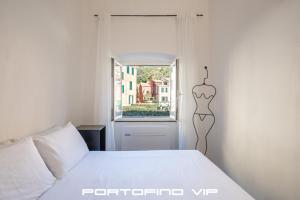 Postel nebo postele na pokoji v ubytování Angolo di mare by PortofinoVip