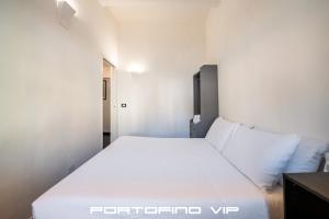 Postel nebo postele na pokoji v ubytování Angolo di mare by PortofinoVip