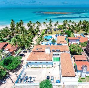 an aerial view of the resort and the beach at Baía Branca Beach Resort in Tamandaré