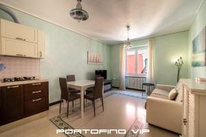 Μια τηλεόραση ή/και κέντρο ψυχαγωγίας στο Portofino Flat by PortofinoVip