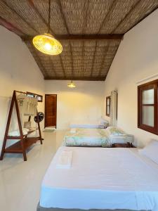 Katil atau katil-katil dalam bilik di Casa Ingapura Treehouse Room - Povoado Bar da Hora - 15 min de canoa para Atins - Estilo B&B - Café da Manhã Simples - Conforto