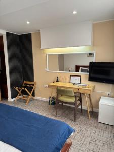 TV o dispositivi per l'intrattenimento presso Hotel Astra