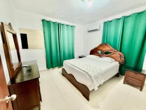 Postel nebo postele na pokoji v ubytování corales apartamento lll