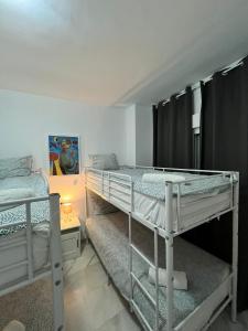 Postel nebo postele na pokoji v ubytování Premium Mármoles Apartments