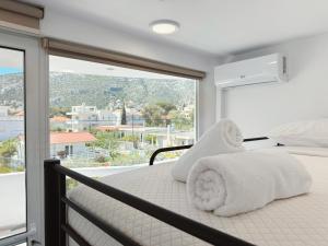 Ένα ή περισσότερα κρεβάτια σε δωμάτιο στο Beachfront 3bedroom apartment