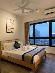Katil atau katil-katil dalam bilik di Agile Orchid service residence TRX by KL +109 gambar