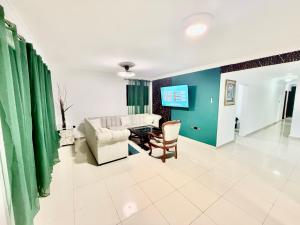 TV a/nebo společenská místnost v ubytování corales apartamento lll