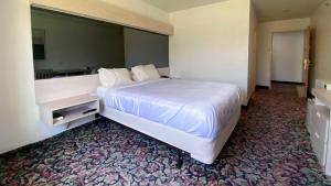 Postel nebo postele na pokoji v ubytování Motel 6 McAlester OK - South
