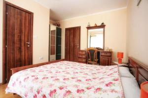 Ένα ή περισσότερα κρεβάτια σε δωμάτιο στο Apartments Simun