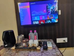 TV i/ili multimedijalni sistem u objektu The Five Dimension