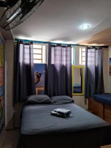 Hostel Trilhas e Rotas - a 150m da Avenida Paulista客房内的一张或多张床位