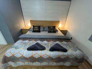 Postel nebo postele na pokoji v ubytování APARTMENTS TRENČÍN