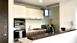 Fotografija v galeriji nastanitve Elegante y comfortable Apartasuite! v mestu Floridablanca