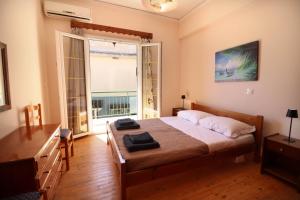 Ένα ή περισσότερα κρεβάτια σε δωμάτιο στο Tassos Village House
