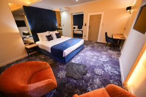 Postel nebo postele na pokoji v ubytování Hotel Ideja
