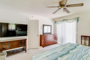 A television and/or entertainment centre at 2 Mi to Water Sebastian Home with Heated Pool!