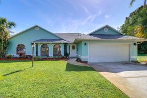 A garden outside 2 Mi to Water Sebastian Home with Heated Pool!