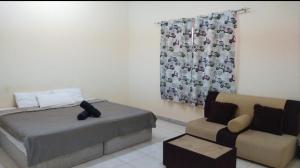 Posezení v ubytování Guest house in New kwaitat near Al Ain Mall