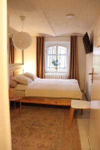 En eller flere senger på et rom på Hostel Bertha-Marie Vanilletraum