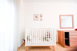 Posteľ alebo postele v izbe v ubytovaní Dafni's house