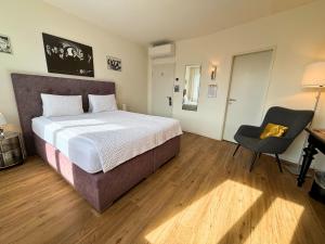 Rúm í herbergi á Hotel Movieworld