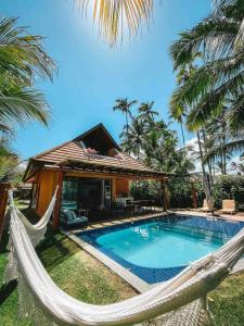 Πισίνα στο ή κοντά στο Bangalô Beira Mar na Praia dos Carneiros