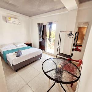 Ένα ή περισσότερα κρεβάτια σε δωμάτιο στο HOTEL BOUTIQUE EL POBLADO DESERT