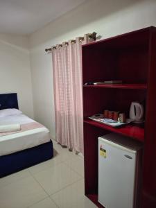 Postel nebo postele na pokoji v ubytování Tavua Hotel Ismail Investments