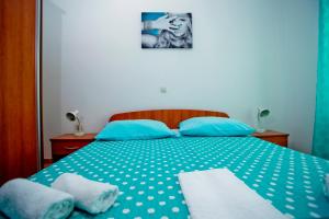 Postel nebo postele na pokoji v ubytování Apartments Alać