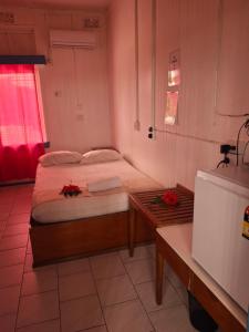 Postel nebo postele na pokoji v ubytování Tavua Hotel Ismail Investments