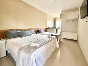 Your Home - Studios Boutique Hotel客房内的一张或多张床位
