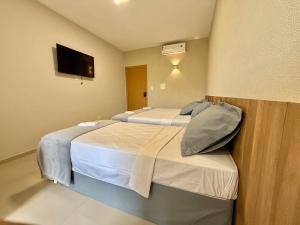 Your Home - Studios Boutique Hotel客房内的一张或多张床位