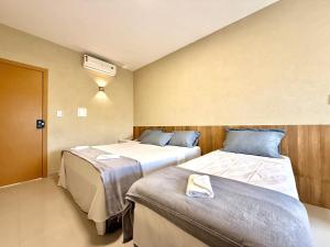 Your Home - Studios Boutique Hotel客房内的一张或多张床位