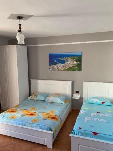 Postel nebo postele na pokoji v ubytování Vila Sokolaj